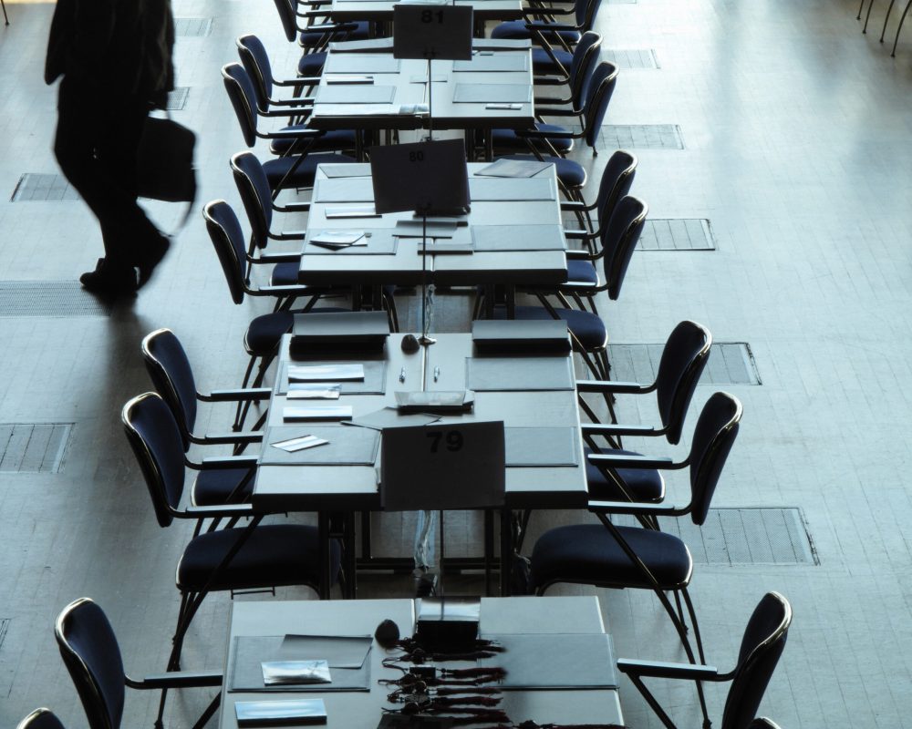 a-high-angle-shot-of-desks-and-chairs-at-a-busines-2025-10-15-04-57-13-utc
